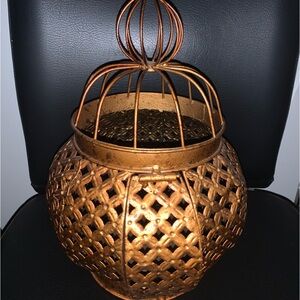 Hanging bronze candle holder